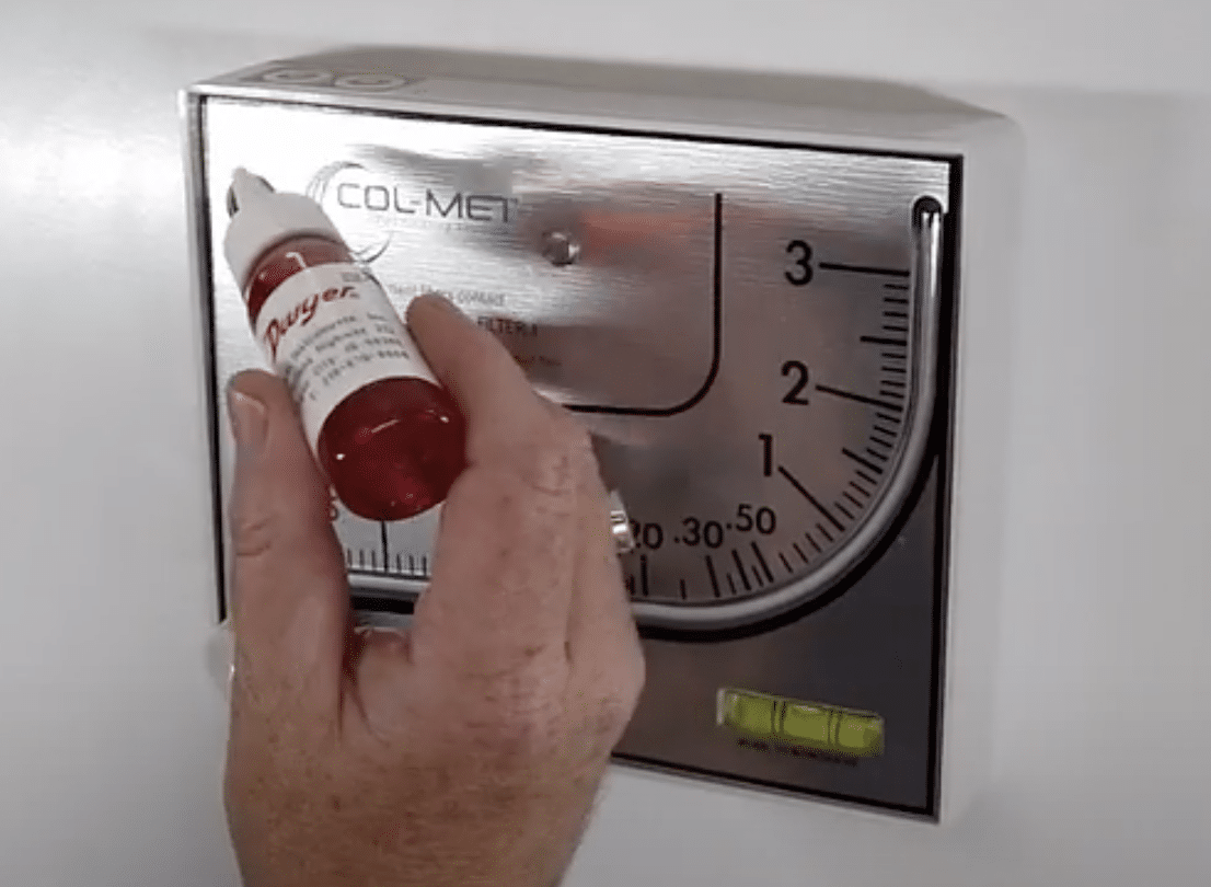 fill the Manometer with the leveling fluid