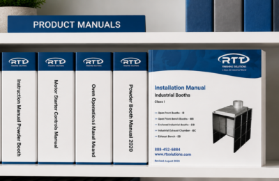 RTT Finishing Solutions product manuals displayed on a modern bookshelf, featuring installation, operation, maintenance, and powder booth manuals organized in a clean library-style setting.